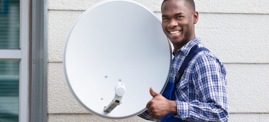Portrait,Of,A,Happy,Male,Technician,With,Tv,Satellite,Dish